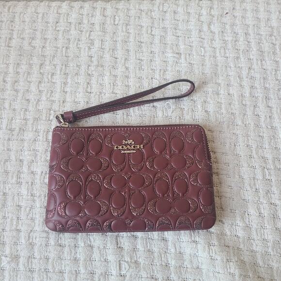 Coach Handbags - Coach Glitter Silver/Wine Leather Corner Zip Wristlet Wallet F80214